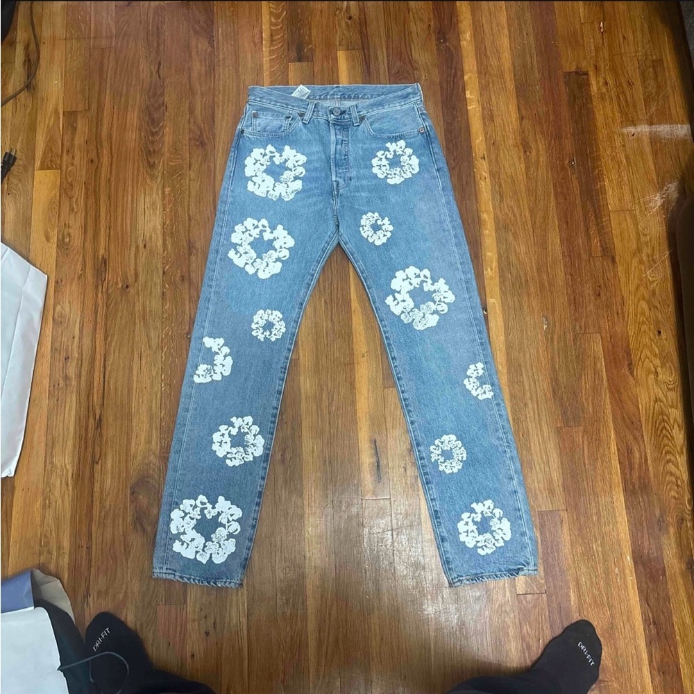 Levi's Blue Jeans with White Floral Patterns